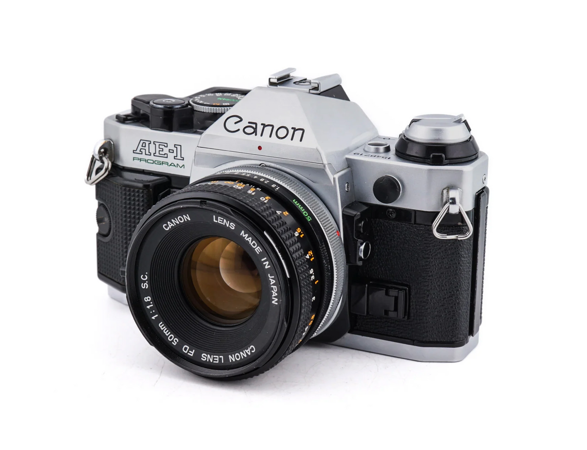 Canon AE-1 Program + 50mm f1.8 S.C. - SLR 35mm Film Camera · imagen principal